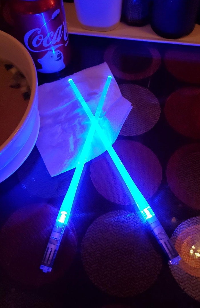 Lightsaber Chopsticks: This Xmas, give your Star Wars obsessed partner a memorable dining experience with these LED lightsaber chopsticks - it's not just a gift, it's a galaxy of fun right on the dinner table!