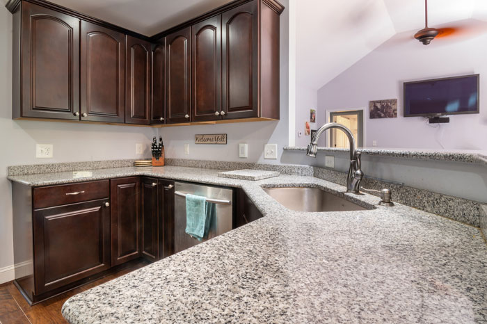 A honed grey granite countertop in the kitchen. 