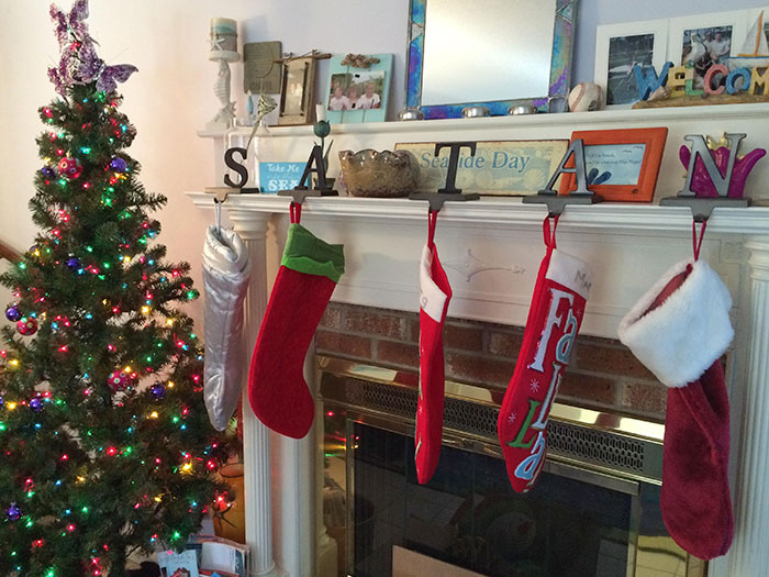 My Favorite Holiday Tradition Is Rearranging My Mom’s Stocking Hangers While She’s Not Looking