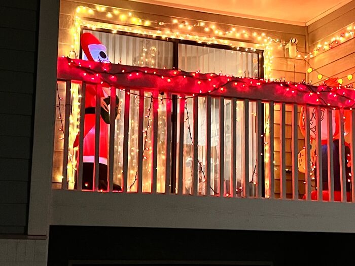 I Decorated My Apartment Balcony With Red And Yellow Christmas Lights