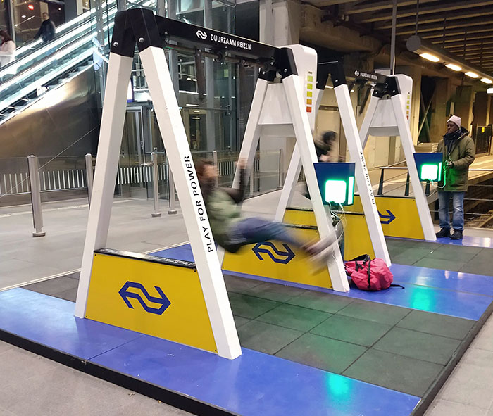 These Public Swing-Powered Chargers For Your Phone In A Train Station