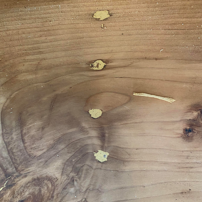 Wood filler-filled holes