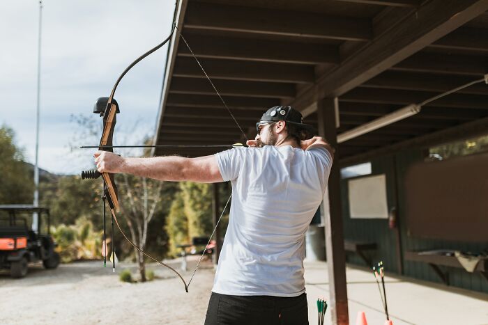 Man aiming with a bow and arrow 
