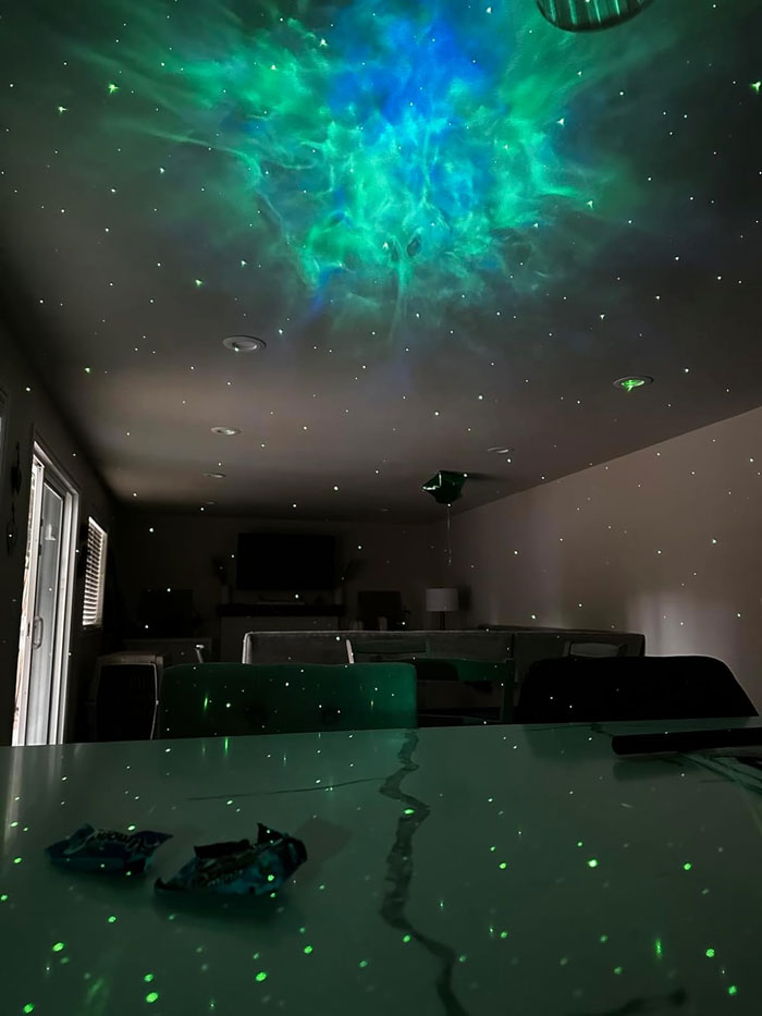 Astronaut Space Projector: Transforming your regular room into a serene interstellar journey with its surreal nebula patterns and twinkling stars – perfect for festive mood or peaceful slumber. It's your chance to have a personal galaxy – let's create your cosmic atmosphere, space cadet!