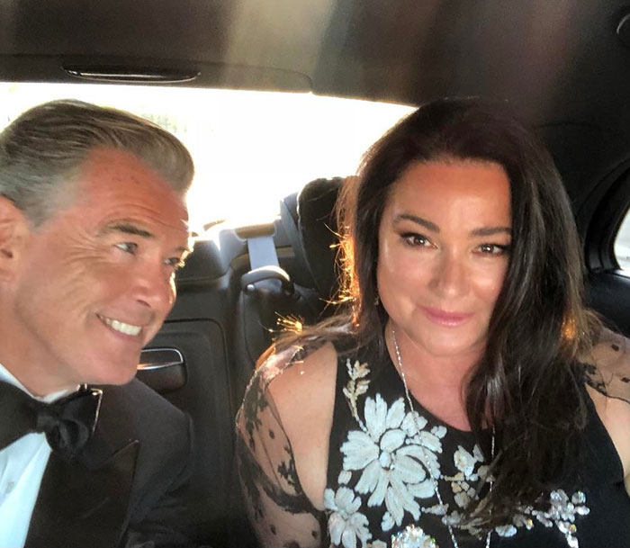 Viral Tweet Attempting To Mock Pierce Brosnan's Wife Backfires As People Slam Body-Shaming Troll