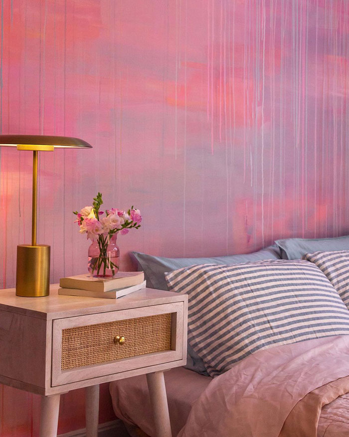 Pink wall painting design with paint drips.