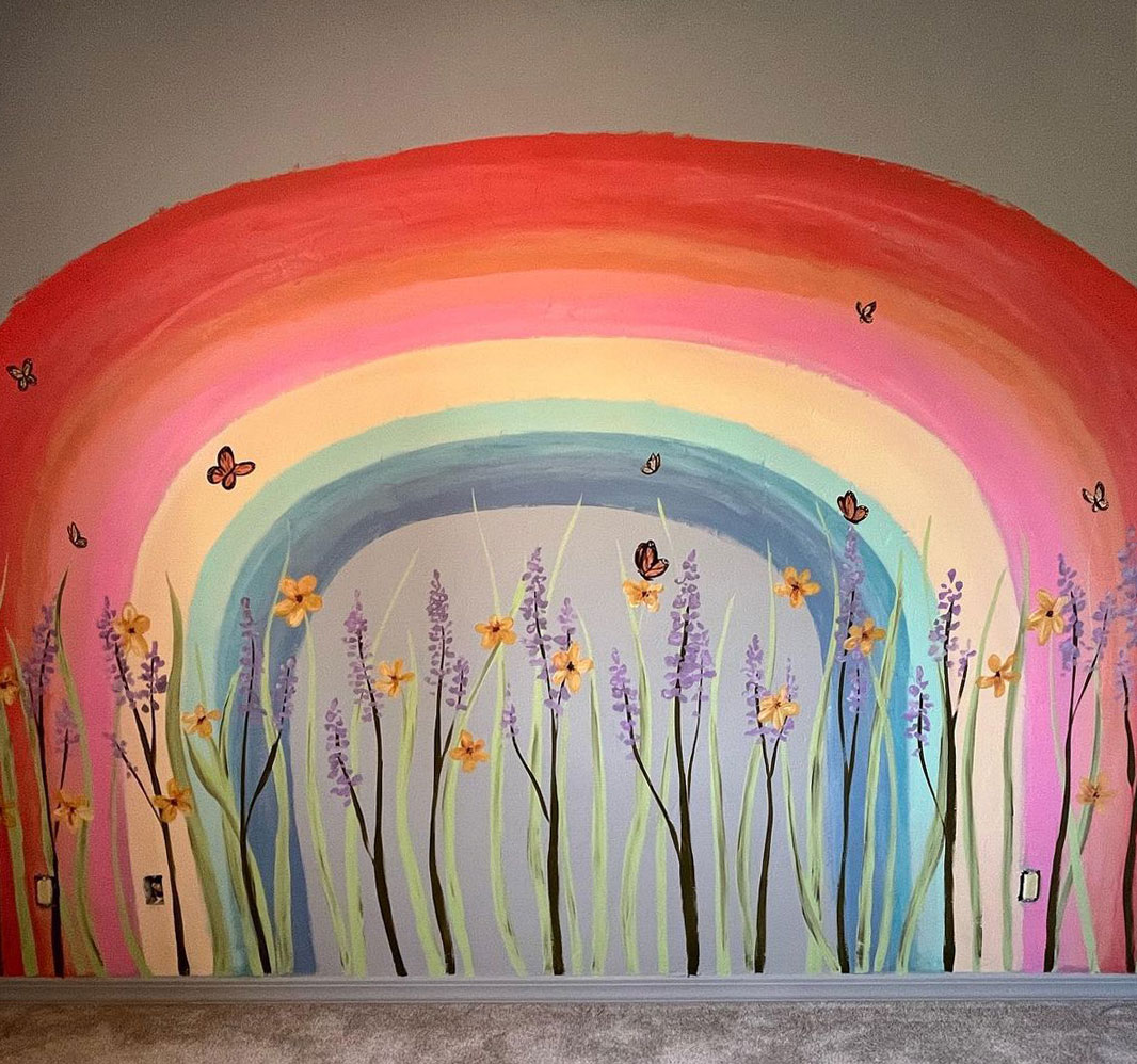 Rainbow drawing on the wall.