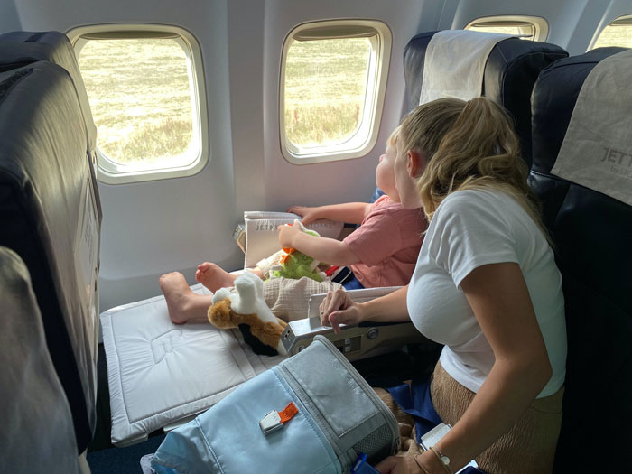 Plane Passenger Finds Her Seat Occupied By Mom With A Kid After Coming Back From The Bathroom