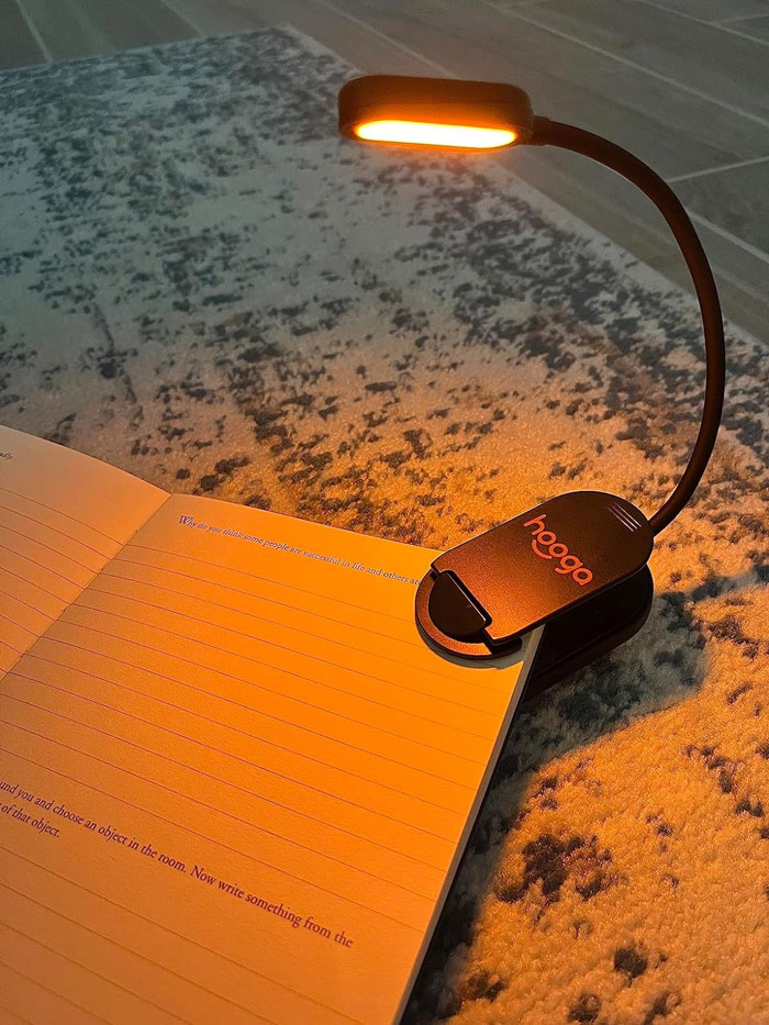 Perfect For Bedtime Bibliophiles, This Amber Book Light Offers Romantic, Sleep-Friendly Illumination Without The Page-Flip Night Disturbance