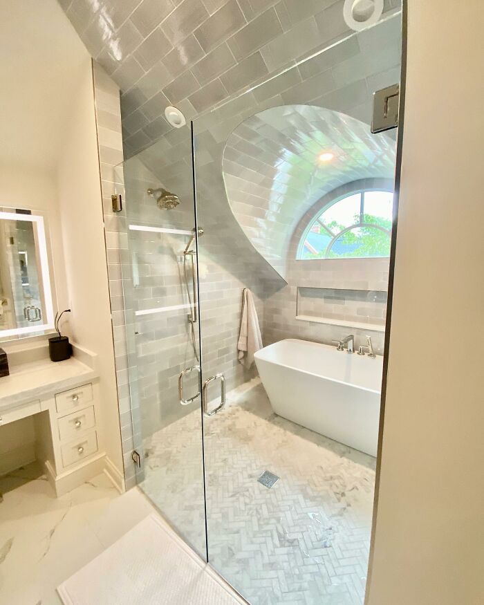Bright Walk-In Shower With Tub Under Sloped Ceiling 