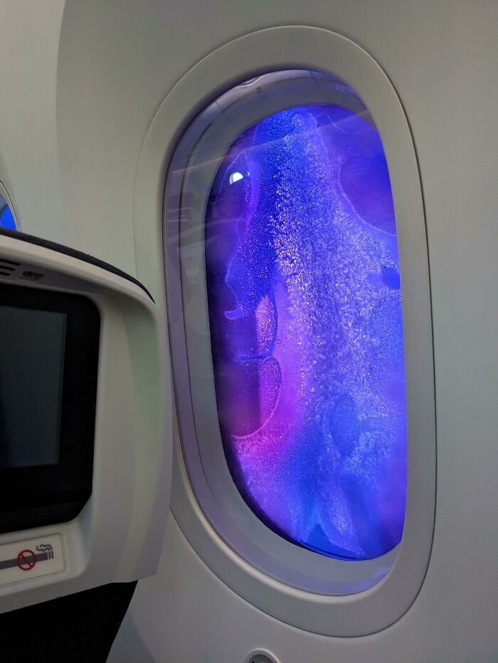 The Frozen Windows On My Plane Made It Look Like We Were Flying Through A Nebula