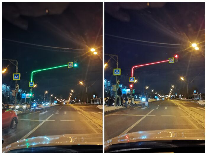 Semáforo con el poste iluminado en Moscú, Rusia