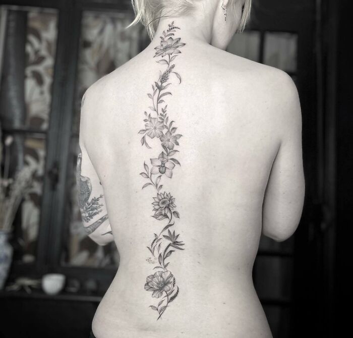 Floral tattoo on spine