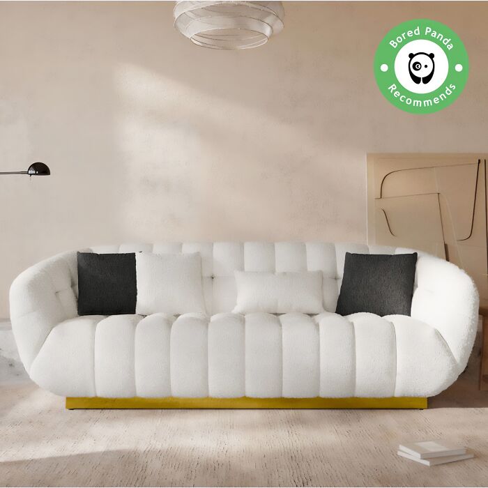 White cloud couch with whitr and black pillows