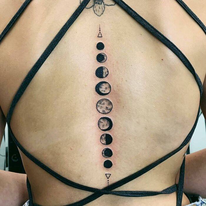 Moon phases tattoo on back
