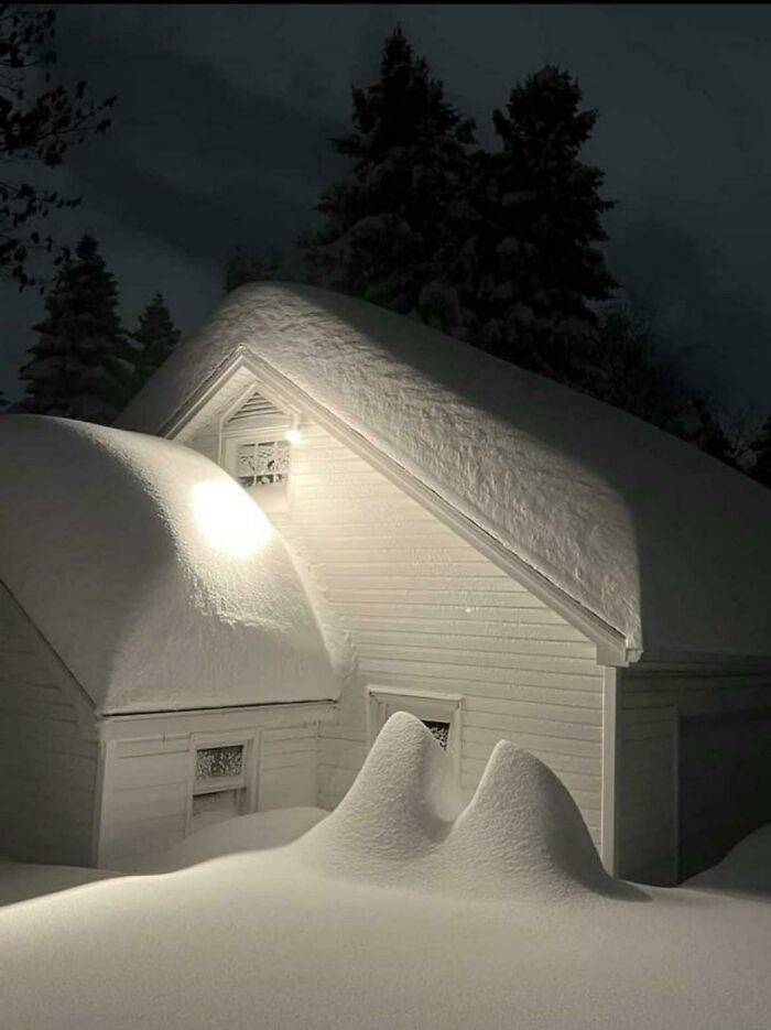 House Covered In Snow