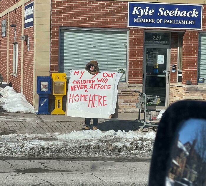 Shoutout To This Guy Standing All Day In The Bitter Cold To Protest Housing Affordability In Orangeville