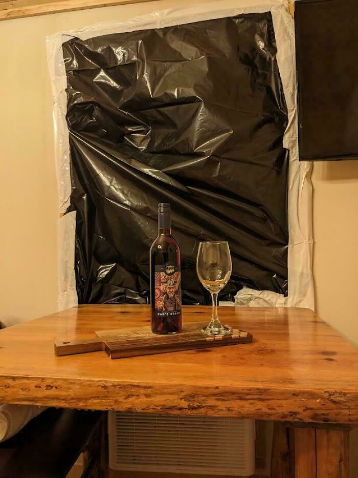 My Wife And I Rented A Cabin. We Arrived To Find A Trash Bag For A Window, And Wine Service For One