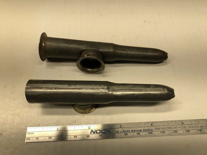 Two Small Metal Items With Cloth Inside The Hole On The Side
