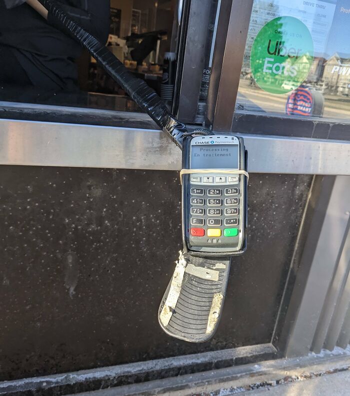This Drive-Through In Canada Has Their Debit Card Machine Attached To A Hockey Stick