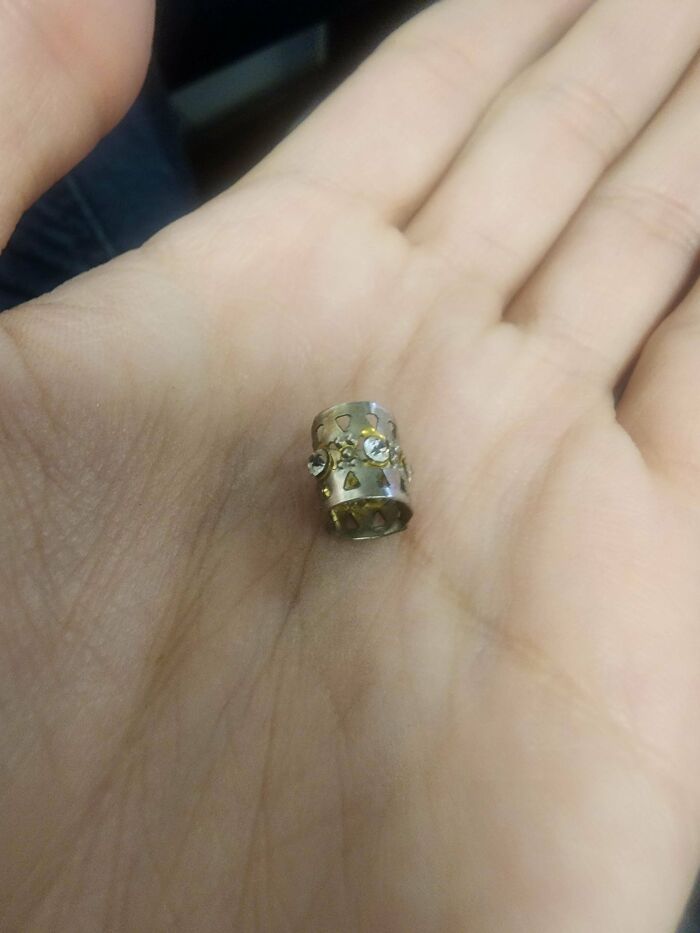 Easily Malleable Metal, With Diamonds In The Center. I Have Four Of Them, And They Were All Rolled Up Like The First Picture
