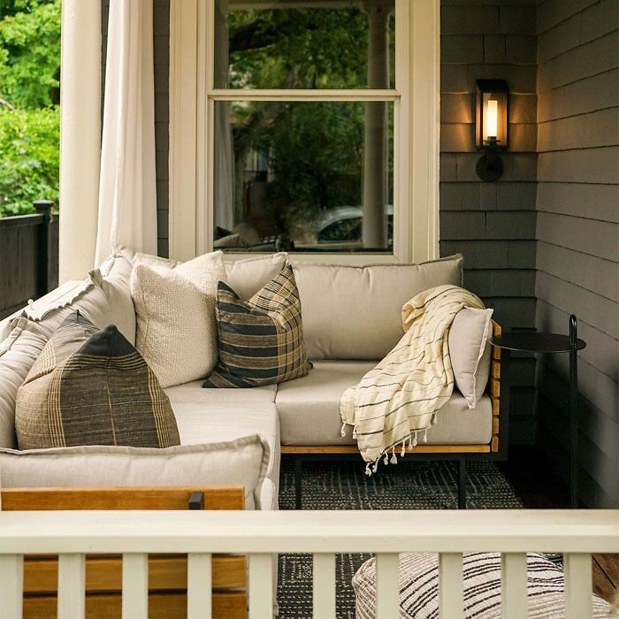 Reading nook space in porch with sofa