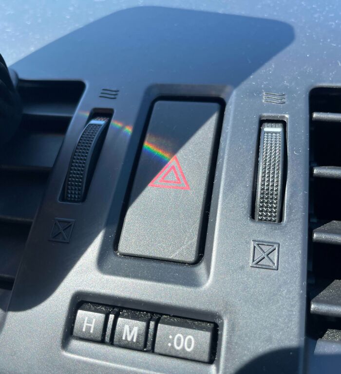 A Reflection From My Friend’s Phone Created A Pink Floyd Album Cover On Her Hazard Button