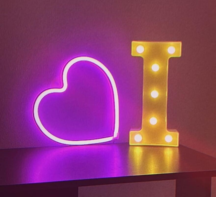 When The Room Lights Up Like Your Dazzling Smiles, That's The Pink Heart Neon Sign Weaving Its Electric Charm 
