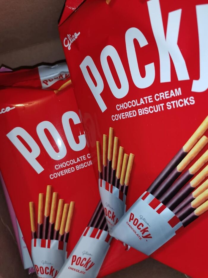 Picture This: You, Your Phone, And A Box Of Glico Pocky, Chocolate Cream Covered Biscuit Sticks – Sounds Like The Perfect Scroll Sidekick For A Sweet And Crunchy Intermission, Right? Could Only Be Made Better By Someone To Play The Pocky Game With...