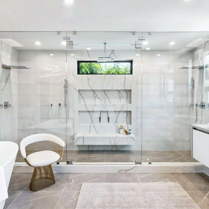 Spacious and bright Long Walk-In Shower with a window 