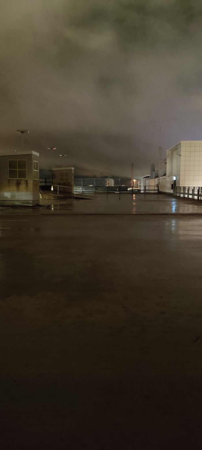 The Roof Level Of The Parking Garage At Night