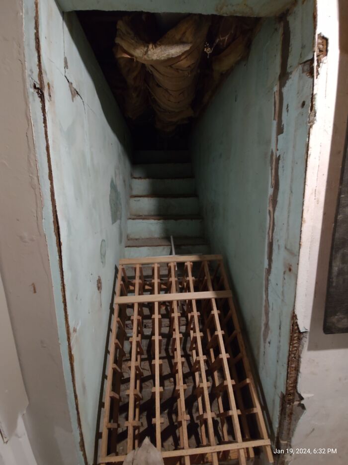 Stairs That Lead Straight Into The Solid Ceiling In Our Basement. If There Was An Opening, It Would Lead Right Under The Deck