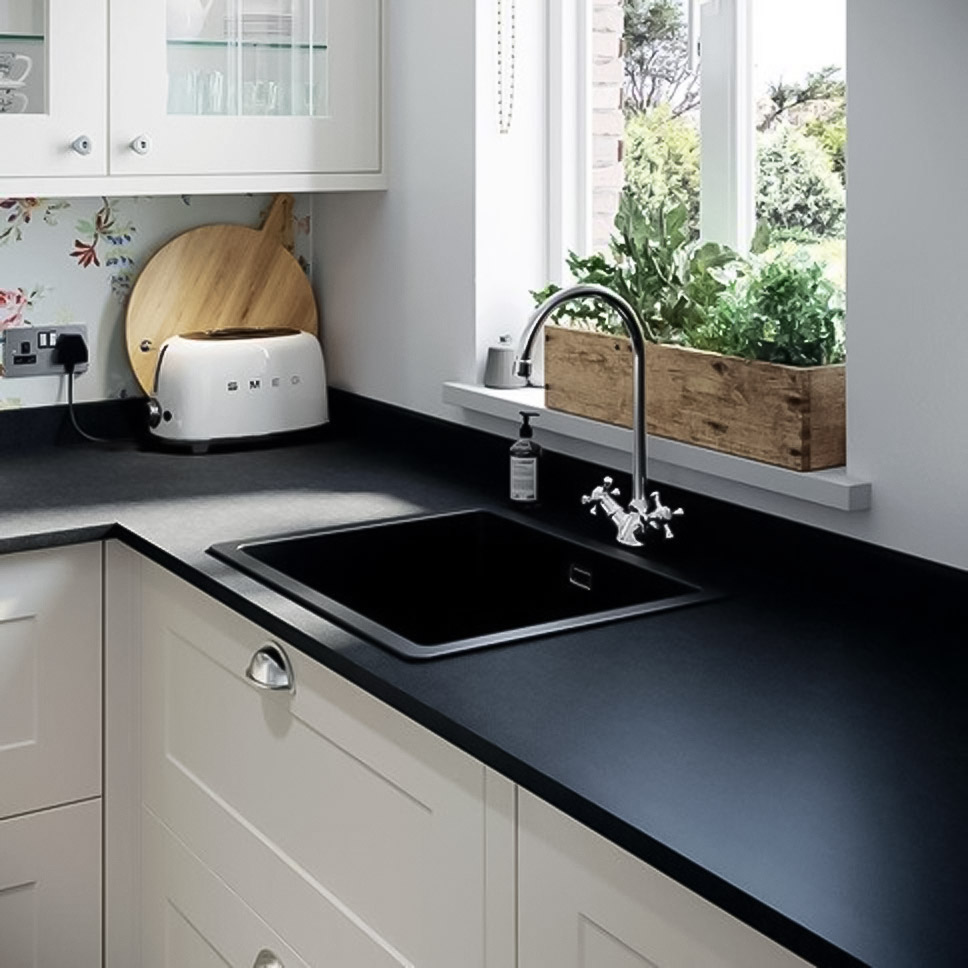 Kitchen with black matt laminate countertop