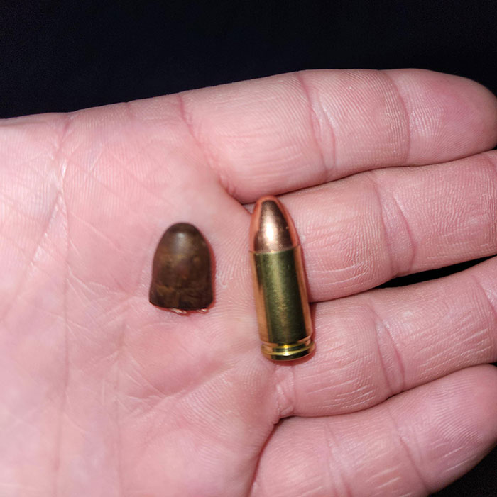 An Unfired 9-Millimeter Bullet Next To The One That Was Inside Me For 4 Years