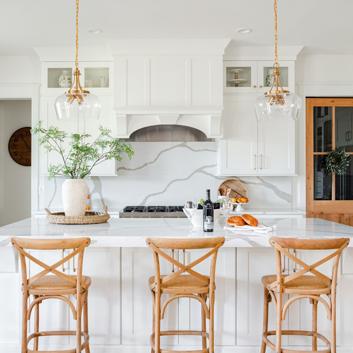 white kitchen cabinets with white corian countertop