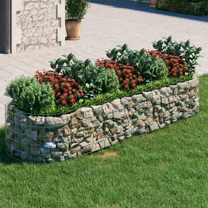 Picture of gabion flower bed edging with red flowers