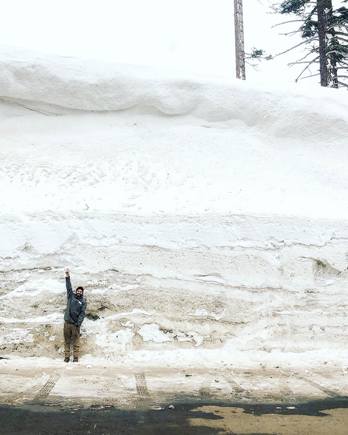This Is Tony - Our 5’10” Terrain Parks Day Lead Extraordinaire. This Is Also The Snow Bank In C-Lot. How Many Feet (Or Tonys) Tall Do You Think It Is?