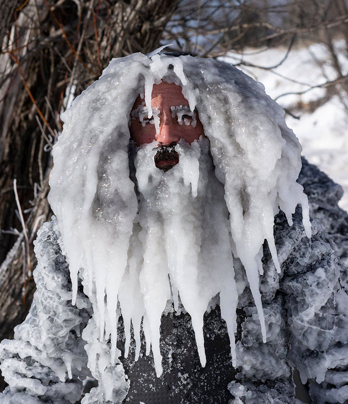 Surfer After Riding Waves In Lake Superior During Polar Vortex