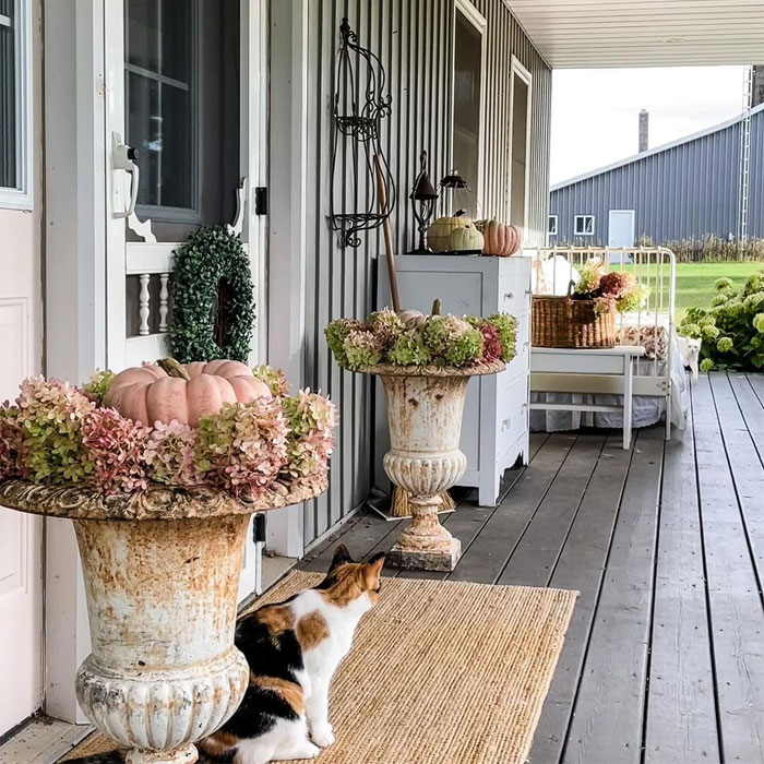 House porch with vases and flowers