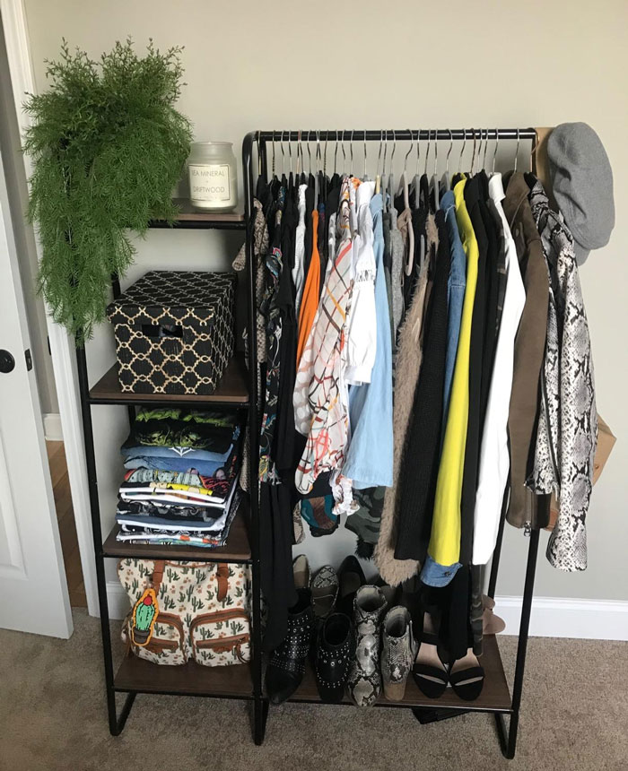 A Metal Garment Rack With Wooden Shelves That Won't Let Your Space-Challenged Apartment Become An Episode Of Clutter Chaos. Say Goodbye To 'Clothes' Chair, Finally!
