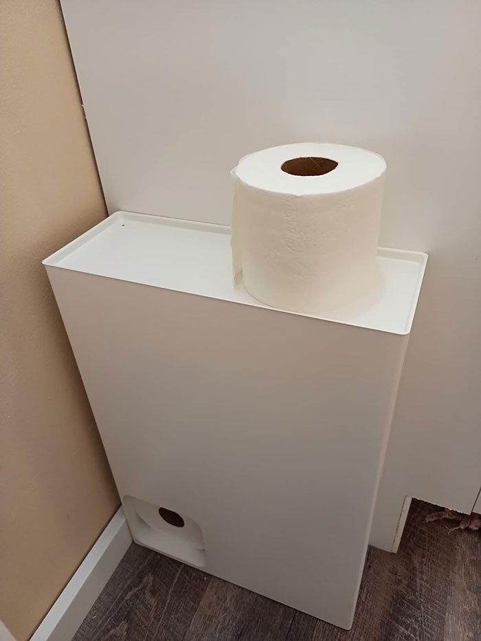 A Sleek Toilet Paper Stocker That Dispenses Rolls Like It's Its Job (Because It Is) And Doubles As A Shelf. No More Awkward Cabinet Rummaging, Ever!