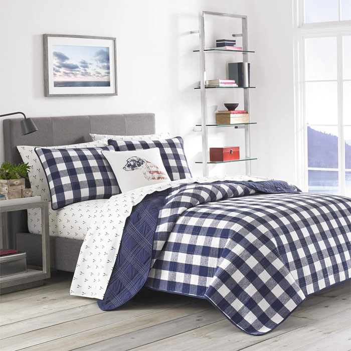 Navy blue gingham pattern on the bed