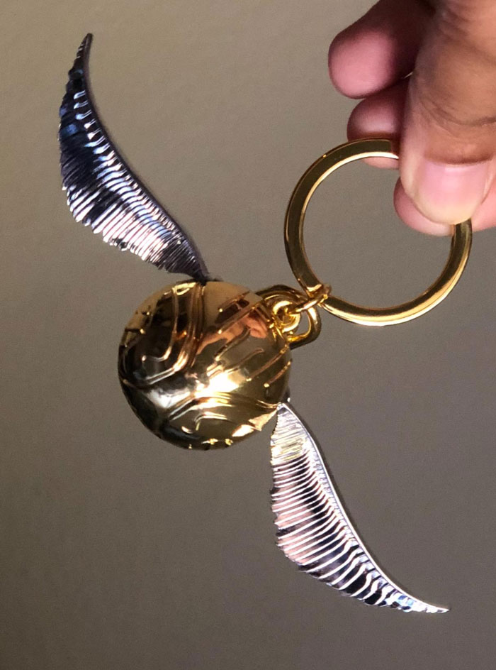 Keep Your Keys In Check While Channeling Your Inner Seeker With This Durable Real-Metal Golden Snitch Key Ring