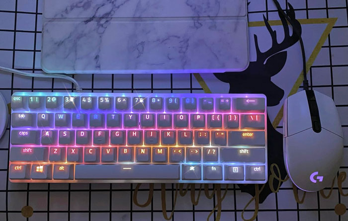 Mini 60% Gaming Keyboard: It'll make typing out emails feel like an intense gaming session! With keys faster than the speed of light and customizable colors for the ultimate personalization, this keyboard will help you dominate the work-from-home game with style.