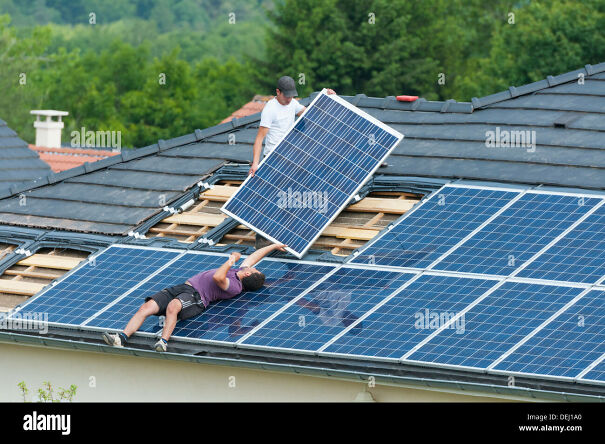 installation-of-photovoltaic-solar-panels-on-roof-of-house-germany-DEJ1A0-6596799612583.jpg