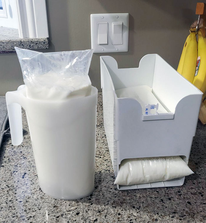 In Some Parts Of Canada, We Buy Milk In Bags. 3 Bags Are Packaged In 1 Bag Totalling - 4 Liters. A Plastic Jug Holds The Bag While The Corner Is Cut To Pour Out