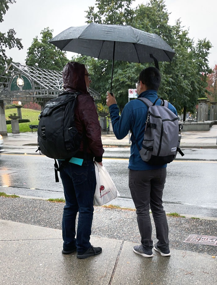 Today, A Guy On The Right Offered To Share His Umbrella With The Guy On The Left, A Stranger, While They Were Waiting For The Bus In The Rain