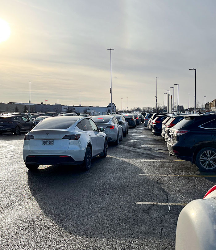 Lineup Of Teslas Waiting For A Charging Station At Vaughan Mills, Ontario