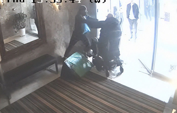 CCTV Captures Violent Altercation Between Amazon Worker And Wheelchair-Bound Man CCTV Captures Violent Altercation Between Amazon Worker And Wheelchair-Bound Man