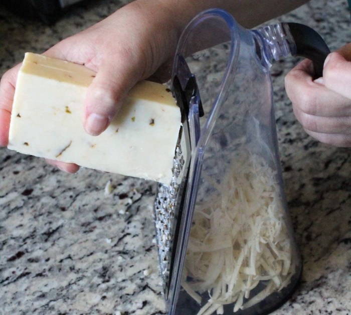 Grate It Or Hate It: The Multi-Purpose Cheese Grater With Garlic Mincer And Peeler